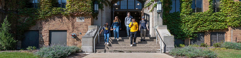 Students walking down steps