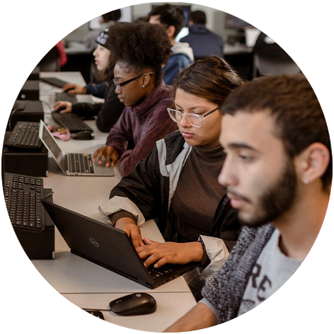 Students working in a computer lab.